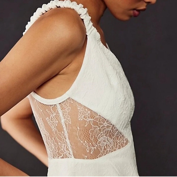 NWOT Free People ALLURING Brooklyn Mini Dress White L Lace Sheer Twirly Pockets - Picture 5 of 16